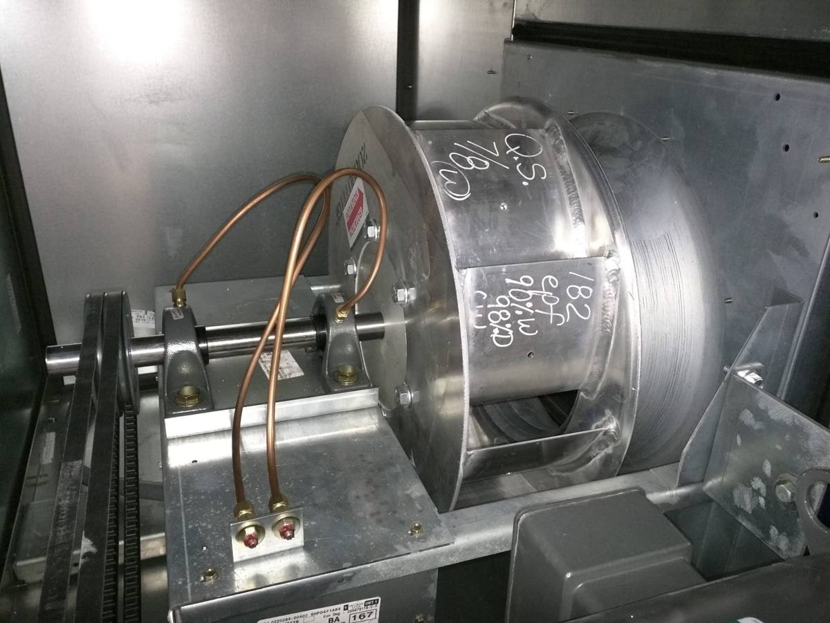 Plenum fan inside an air handler