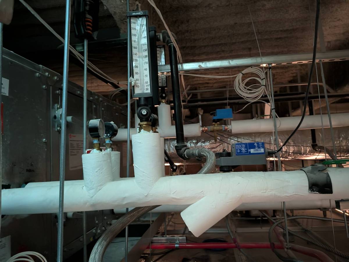 Hydronic piping at an air handler