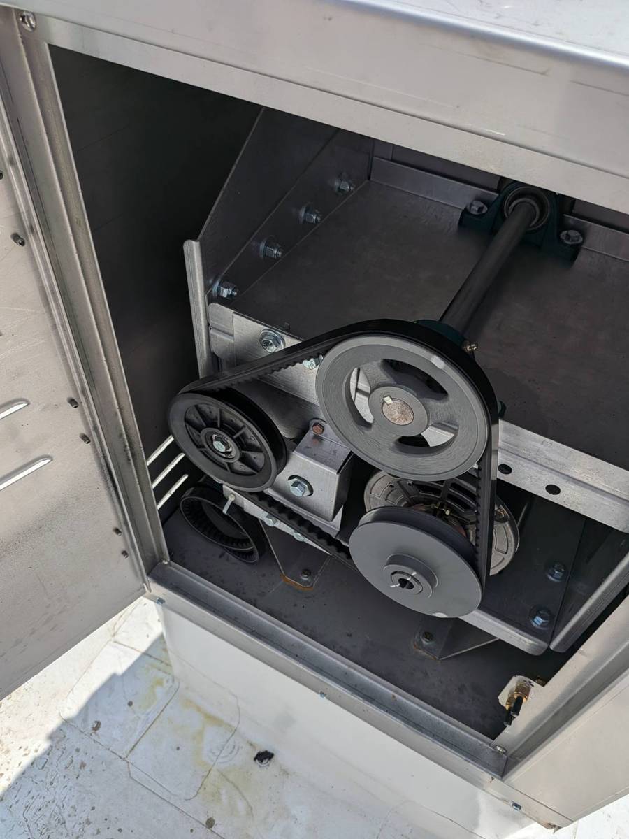 Fan motor and belt drive sheaves inside an air handler