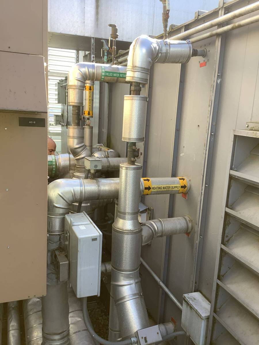Coil piping and control valves at an air handler
